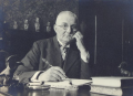 Peter Cornelius Meisters (Peter Meisters) (1875-1938), bewoner van hoeve De Steeg te Beek, houtvester en beheerder van het goed De Bijvank te Beek, gezeten achter zijn bureau circa 1935.png
